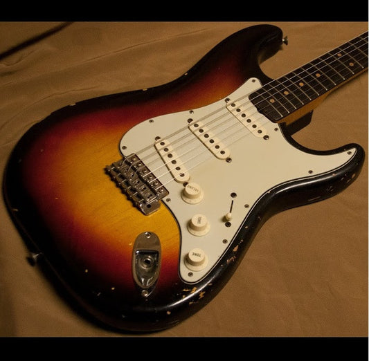 1963 FENDER STRATOCASTER, SUNBURST - Garrett Park Guitars
- 1