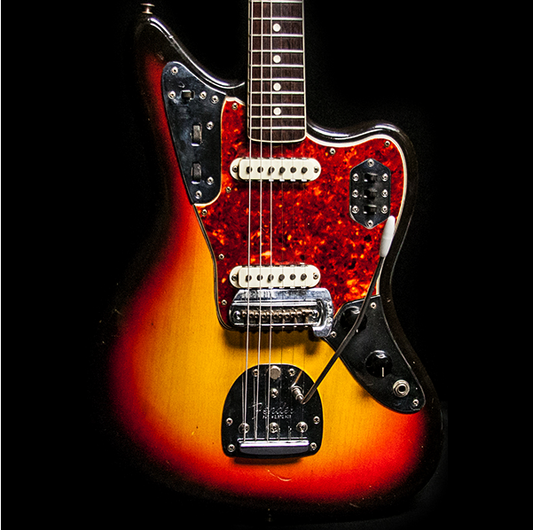 1965 FENDER JAGUAR SUNBURST - Garrett Park Guitars
- 1